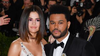 Selena Gomez (L) and The Weeknd attends the 'Rei Kawakubo/Comme des Garcons: Art Of The In-Between' Costume Institute Gala at Metropolitan Museum of Art on May 1, 2017 in New York City.