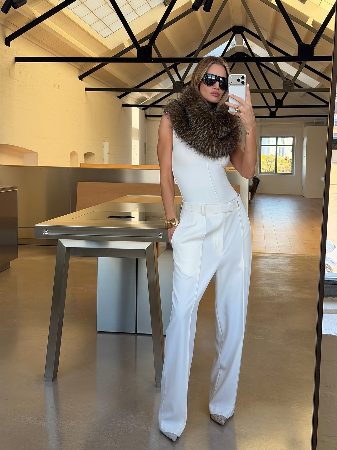 woman wearing oversize sunglasses outfit 2026