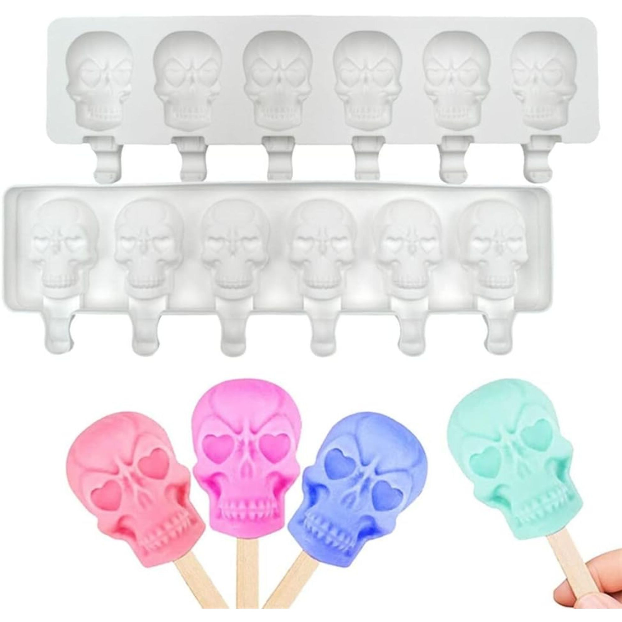 Pink, blue and green skull-shaped ice pop molds