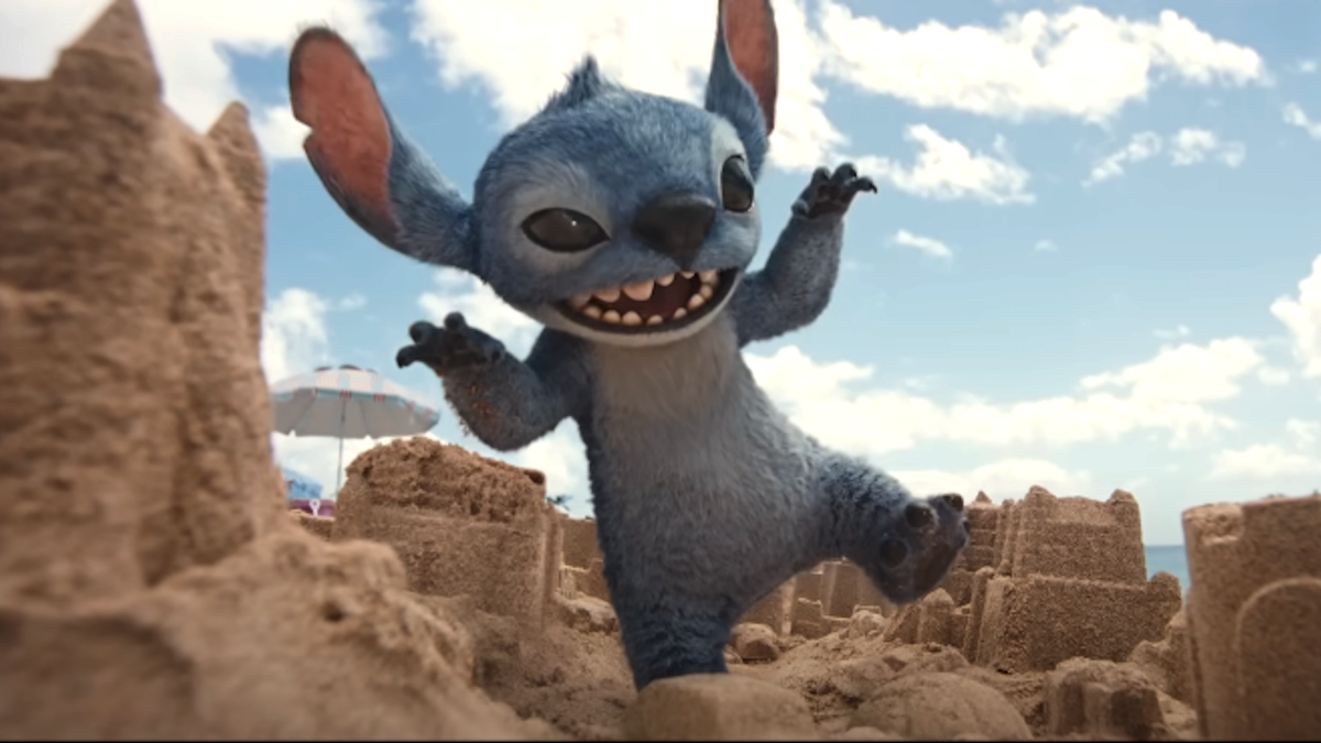 Stitch destroying a sandcastles on a beach in Lilo &amp; Stitch