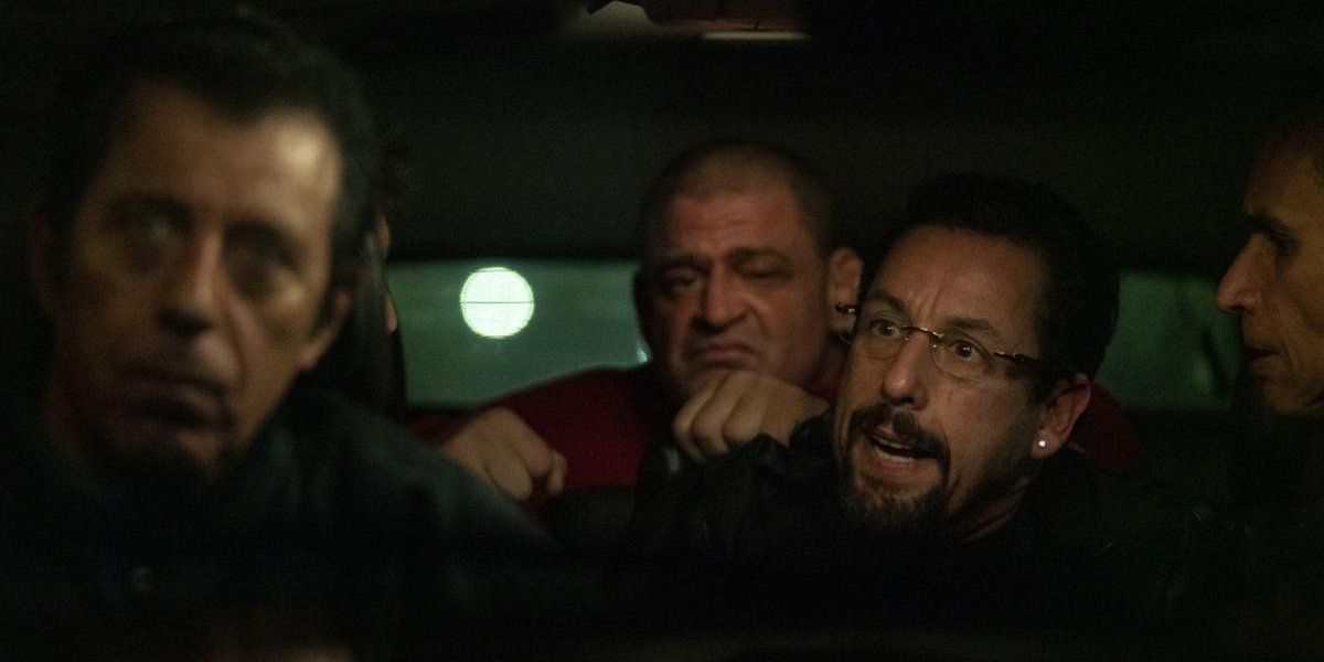 Uncut Gems Adam Sandler captive in a car with Eric Bogosian