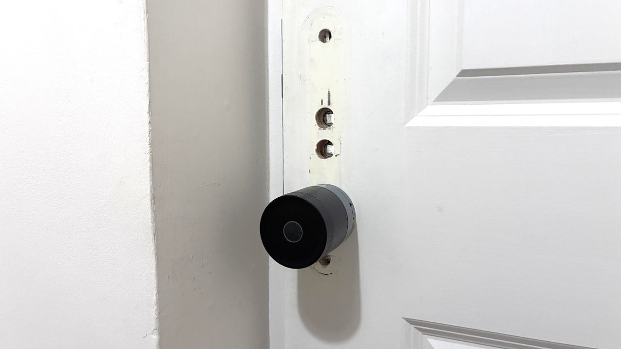 Yale Linus Smart Lock L2 Lite installed on door with light off, and door handle removed