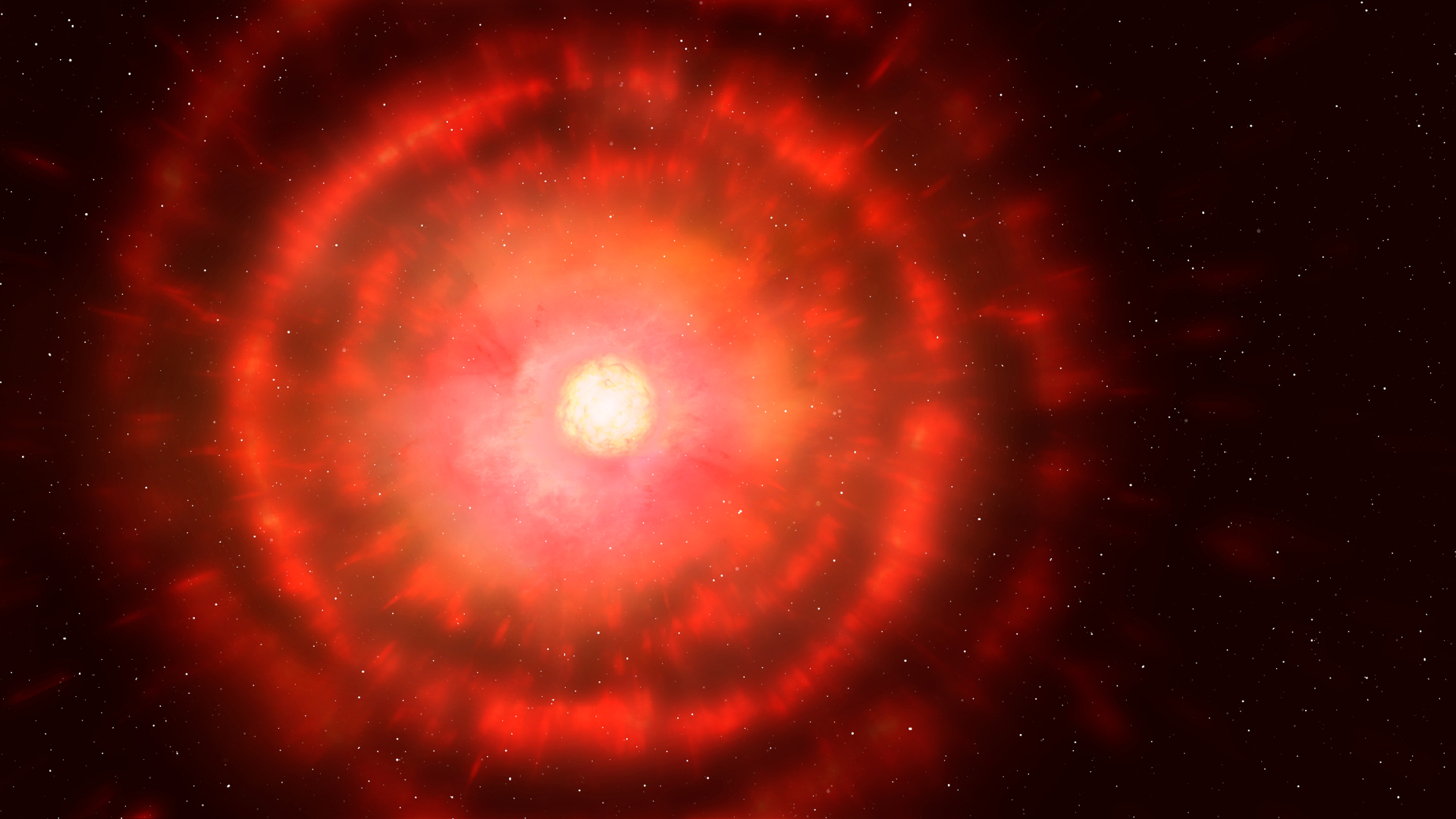 A glowing ball of white light representing a red giant is surrounded by rings of red gas against a black background