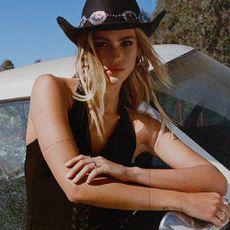 A model wearing western style clothing from Nasty Gal.