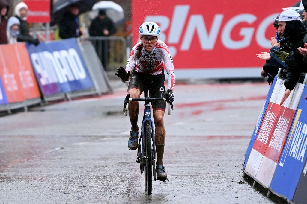 OVERIJSE BELGIUM NOVEMBER 20 Fem van Empel of The Netherlands and Team Pauwel Sauzen Bingoal crosses the finish line on second place during the 62nd UCI Cyclocross World Cup Druivencross Overijse 2022 Womens Elite CXWorldCup Overijse Cyclocross on November 20 2022 in Overijse Belgium Photo by Luc ClaessenGetty Images