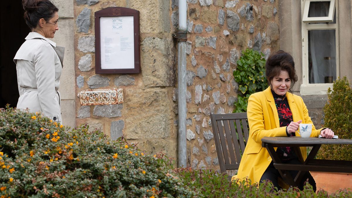 Manpreet talks to Faith Dingle outside the Main Street cafe.