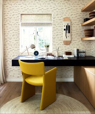 office with modern yellow chair in Victorian mews house in London with contemporary interior designed by Kitesgrove
