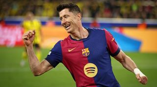 Robert Lewandowski celebrates a Barcelona goal against former club Borussia Dortmund in the Champions League semi-finals in April 2025.
