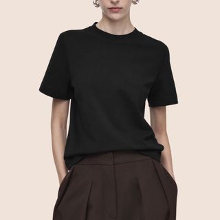 flat lay image of woman wearing black t-shirt