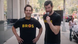 Paul Rudd (left) and Billy Eichner (right) wearing t-shirts with the Bros logo on it at the start of an episode of Billy on the Street.