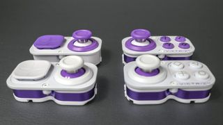 PDP's original modules for the Victrix Pro BFG and its new Hall Effect modules side by side on a desk