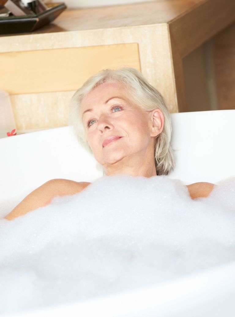Woman relaxing in bath