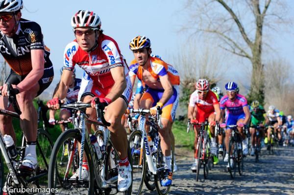 Former world champion Oscar Freire with compatrior Carlos Barredo on his wheel