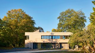 contemporary house with horizontal timber cladding