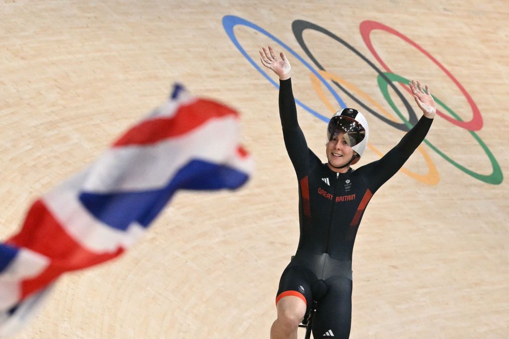 Britain's Emma Finucane celebrates after winning the women's track cycling sprint final race 2 for bronze of the Paris 2024 Olympic Games at the Saint-Quentin-en-Yvelines National Velodrome in Montigny-le-Bretonneux, south-west of Paris, on August 11, 2024. (Photo by SEBASTIEN BOZON / AFP)