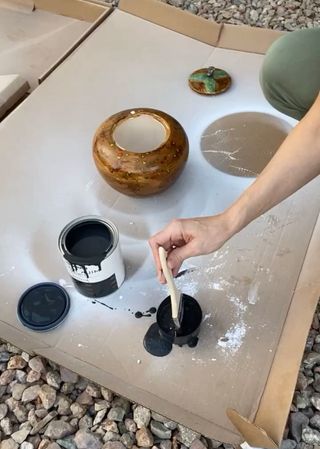 Painting old vase with black