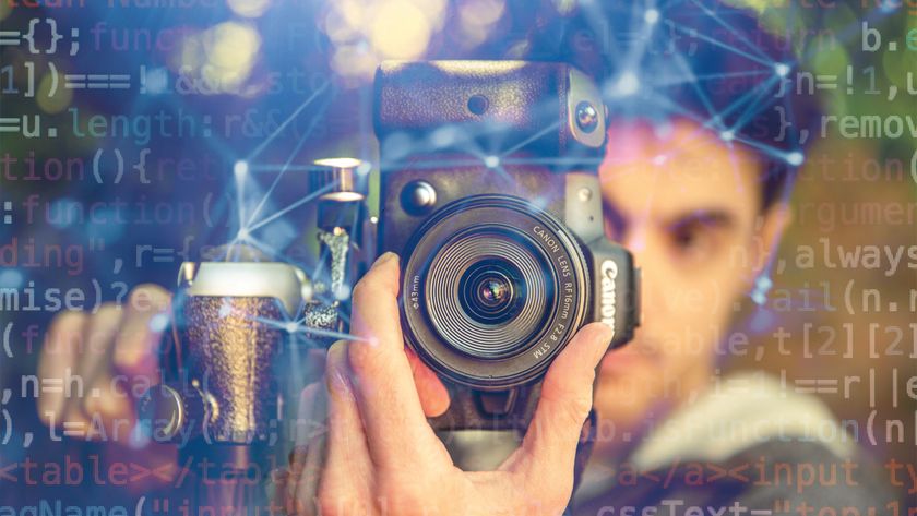 A man with a Canon EOS R5 Mark II camera, the image overlaid with computer code
