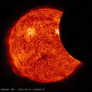 A partial solar eclipse, as observed by NASA's Solar Dynamics Observatory in February 2012.