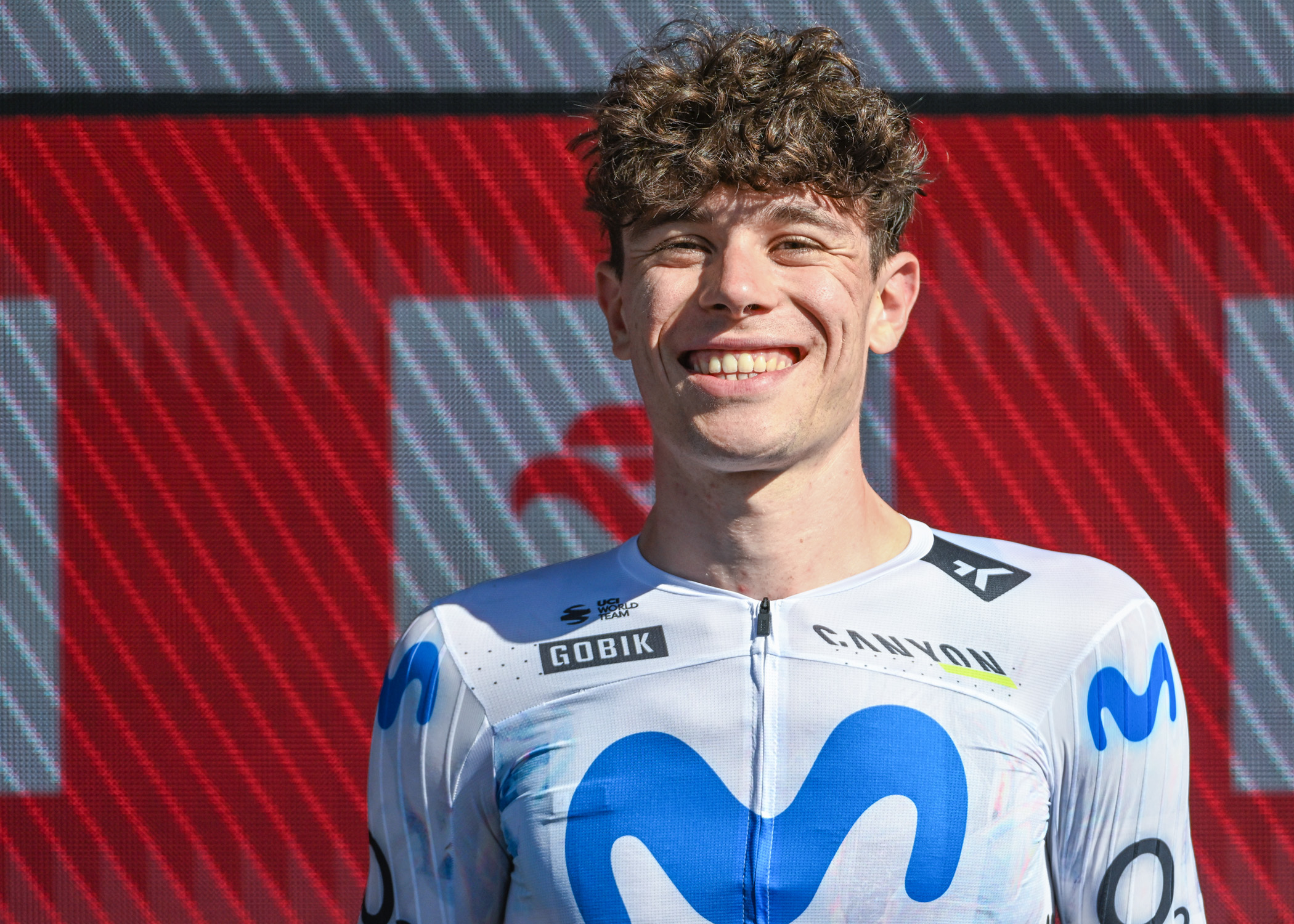 Iv&amp;aacute;n Romeo celebrates on the podium after taking third place at the Tour de Pologne