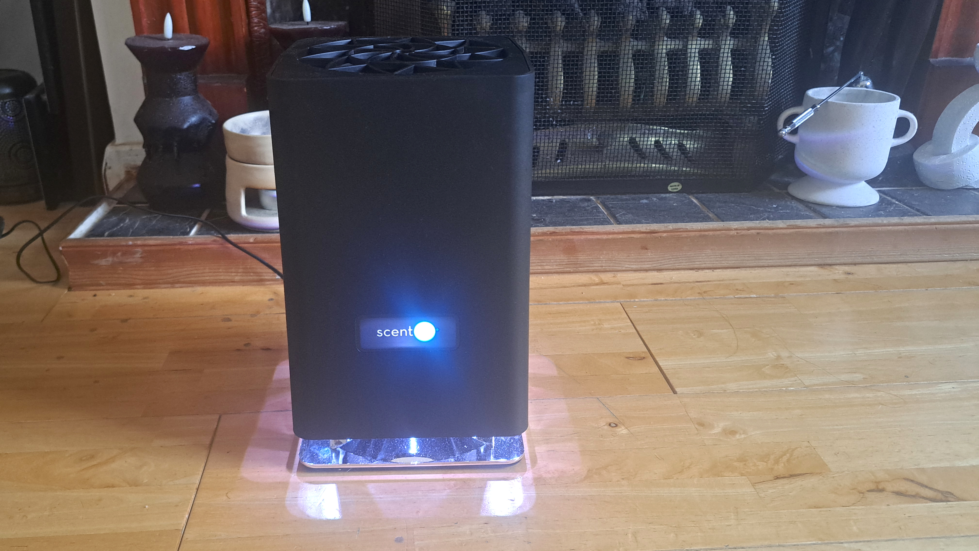 ScentAir diffuser on wooden floor