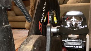 A photo of the Venzo 3-in-1 pedals on the Peloton bike