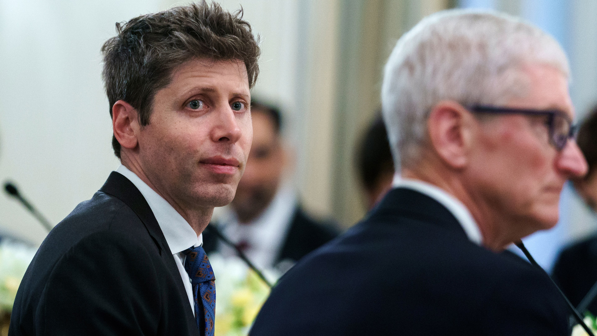 Sam Altman and Tim Cook