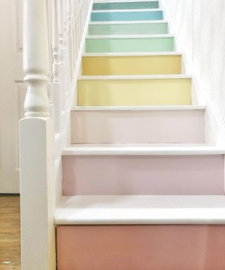 Pastel rainbow staircase design using Graham & Brown sample pots
