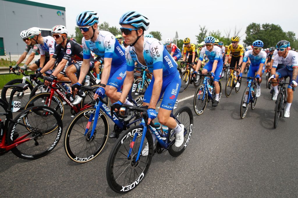 Team BikeExchange Jayco Mitcheltons British rider Simon Yates C Team BikeExchange Jayco Mitcheltons Australian rider Michael Hepburn CL and fellow competitors ride during the first stage of the Giro dItalia 2022 cycling race 195 kilometers between Budapest and Visegrad Hungary on May 6 2022 Photo by Luca Bettini AFP Photo by LUCA BETTINIAFP via Getty Images