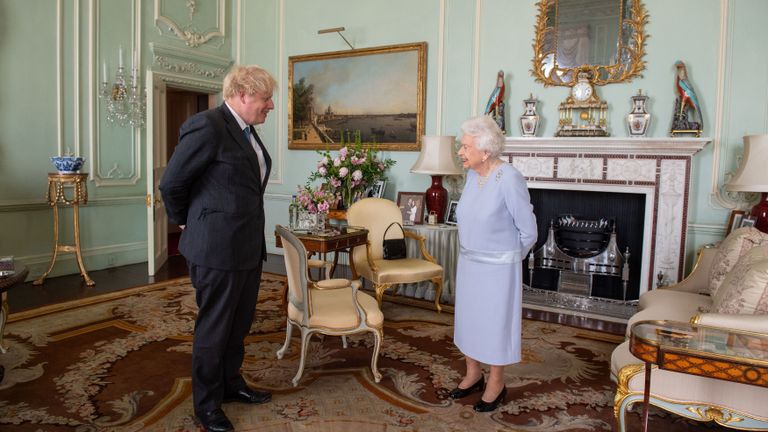 london, england june 23 queen elizabeth ii greets prime minister boris johnson during the first in person weekly audience with the prime minister since the start of the coronavirus pandemic at buckingham palace on june 23, 2021 in london, england photo by dominic lipinski wpa poolgetty images