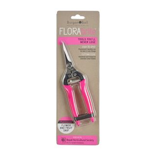 Small pruning shears with pink handles and silver blades encased in brown FloraBrite packaging 