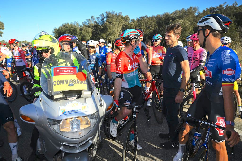 AUBAIS, FRANCE - FEBRUARY 02: (L-R) Jasper De Buyst of Belgium and Team Lotto Dstny and Dries De Bondt of Belgium and Team Alpecin-Deceuninck wait after the neutralization of the stage due to a massive crash during the 53rd Etoile de Besseges - Tour Du Gard 2023, Stage 2 a 169.63km stage from Bagard to Aubais / #EDB2021 / on February 02, 2023 in Aubais, France. (Photo by Luc Claessen/Getty Images)