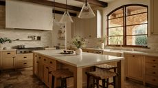 A transitional kitchen in a Spanish-style home