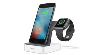 The Belkin PowerHouse charging stand, charging an iPhone and an Apple watch