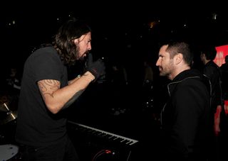 Grohl and Reznor backstage during the 56th GRAMMY Awards at Los Angeles' Staples Center in 2014