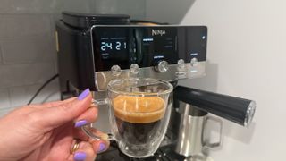 Ninja Luxe Café Mini with a cup of espresso