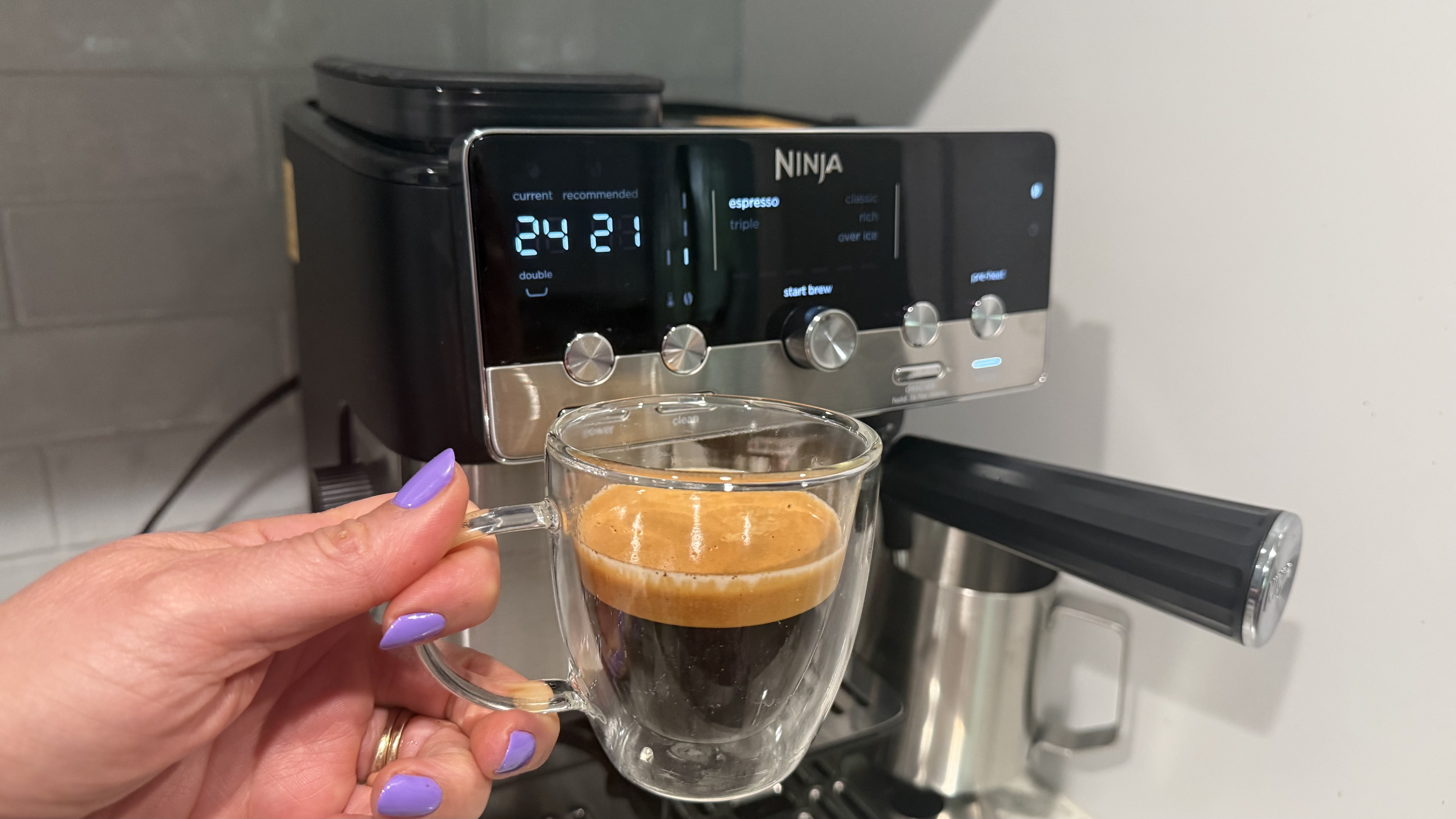 Ninja Luxe Caf&eacute; Mini with a cup of espresso