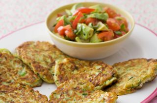 Courgette fritters with tomato and avocado salad