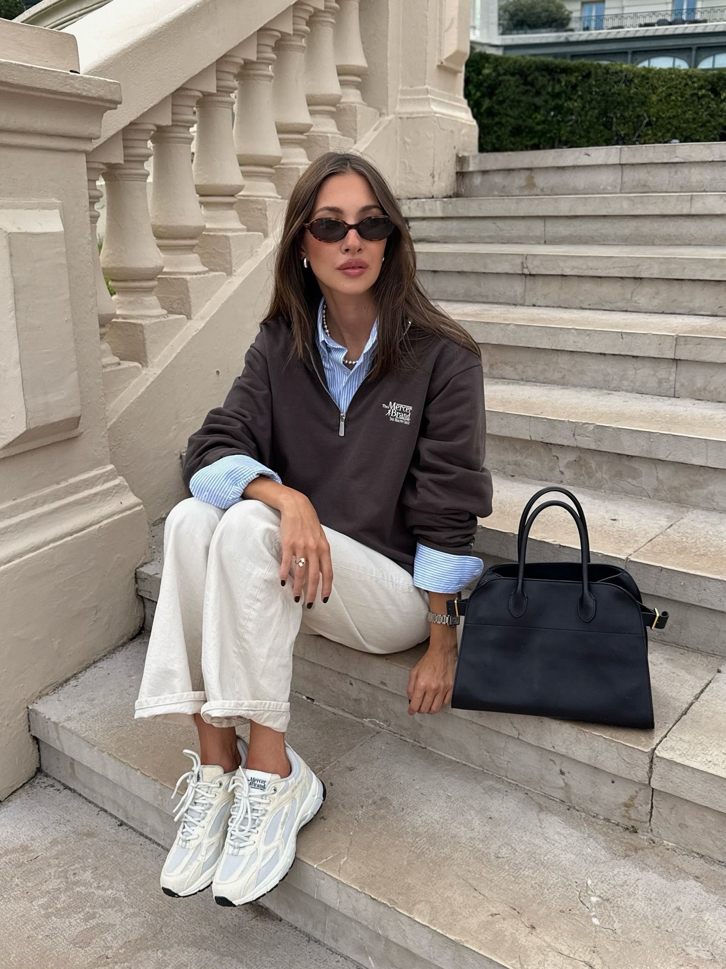 Fashion influencer wearing a quarter-zip pullover