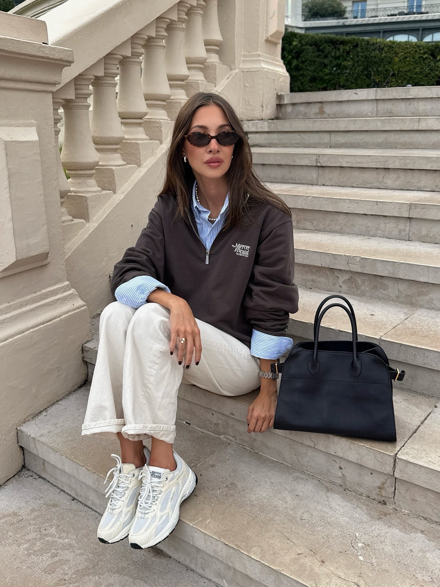 Fashion influencer wearing a quarter-zip pullover