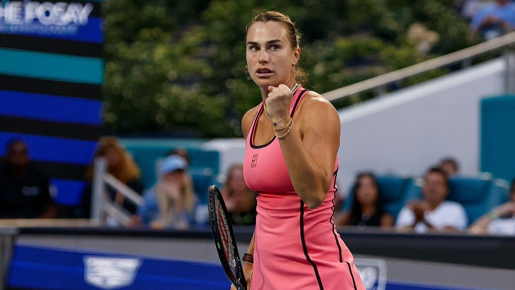 Aryna Sabalenka punches the air after winning a point at the Miami Open 