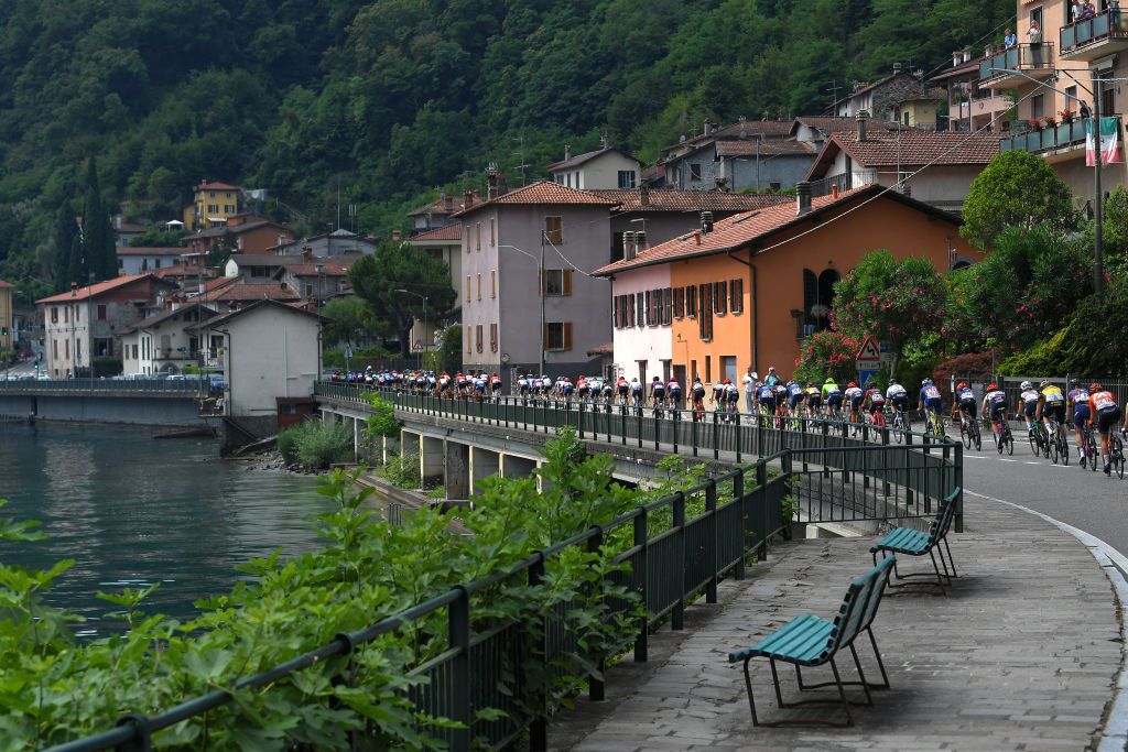 COLICO ITALY JULY 07 The peloton passing through lake Como landscape during the 32nd Giro dItalia Internazionale Femminile 2021 Stage 6 a 155km stage from Colico to Colico GiroDonne UCIWWT on July 07 2021 in Colico Italy Photo by Luc ClaessenGetty Images
