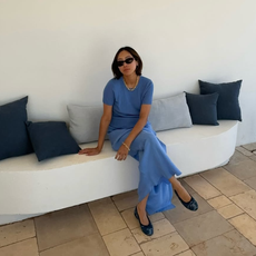 @aimeesong wearing a blue t-shirt and slip skirt