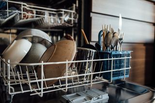 clean dishes in a dishwasher