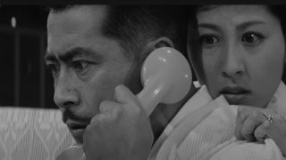 Toshiro Mifune listening in for payment demands in High and Low