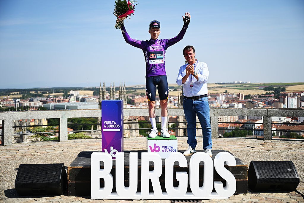 BURGOS, SPAIN - AUGUST 05: Roger Adria of Spain and Team Red Bull - BORA - hansgrohe celebrates at podium as Purple Leader Jersey winner during the 47th Vuelta a Burgos 2025, Stage 1 a 204.7km stage from Olmillos de Sasamon to Burgos on August 05, 2025 in Burgos, Spain. (Photo by Antonio Baixauli/Getty Images)