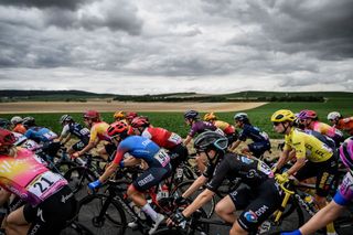 Yellow Jersey Team Jumbo Vismas Dutch rider Marianne Vos rides with the pack past vineyards during 3rd stage of the new edition of the Womens Tour de France cycling race 1336 km between Reims and Epernay on July 26 2022 Photo by JEFF PACHOUD AFP Photo by JEFF PACHOUDAFP via Getty Images