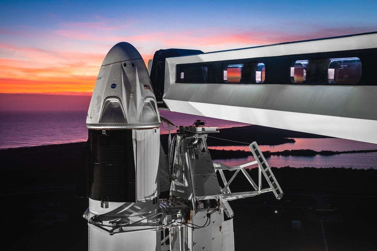 SpaceX&#039;s first Crew Dragon spacecraft is seen atop its Falcon 9 rocket at Launch Complex 39A of NASA&#039;s Kennedy Space Center in Cape Canaveral, Florida.