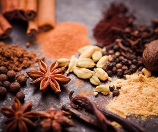 A selection of spices in a wooden table