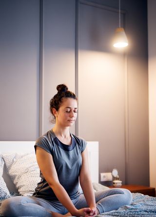 Woman relaxing in bed