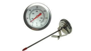 A sugar thermometer with dial